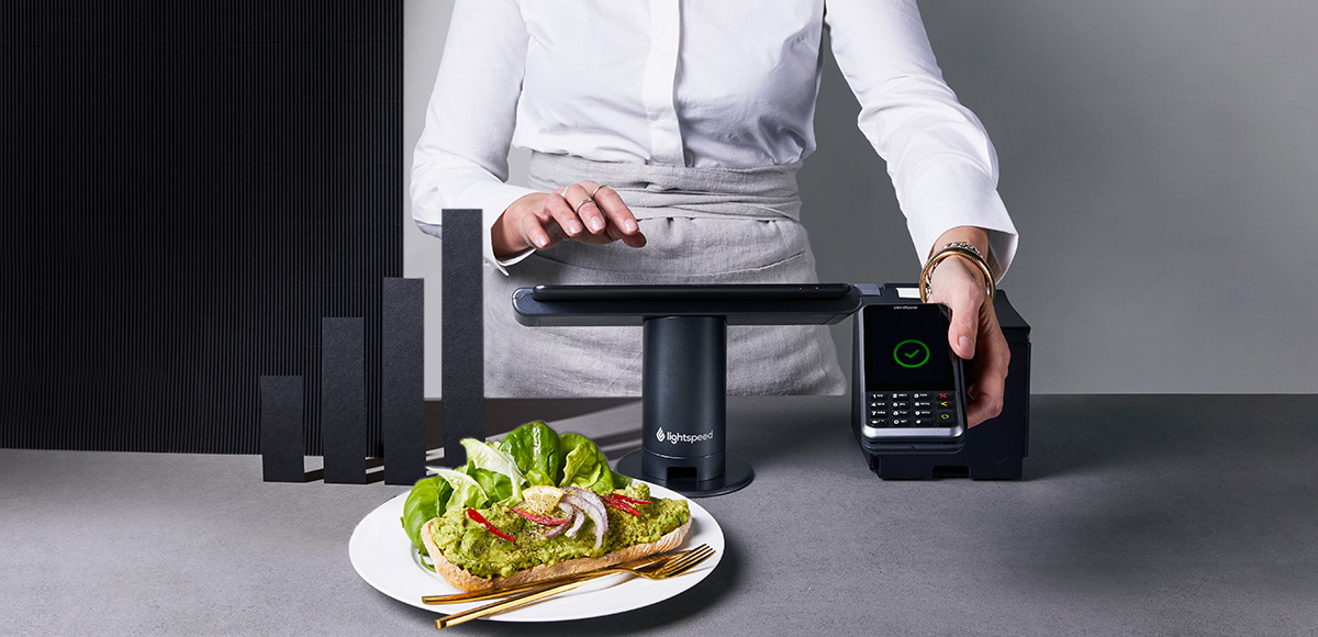 Woman standing behind the Lightspeed ePOS