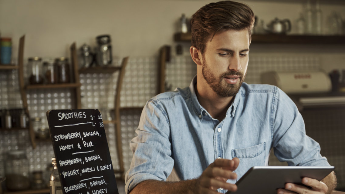 Bakery employee with iPad