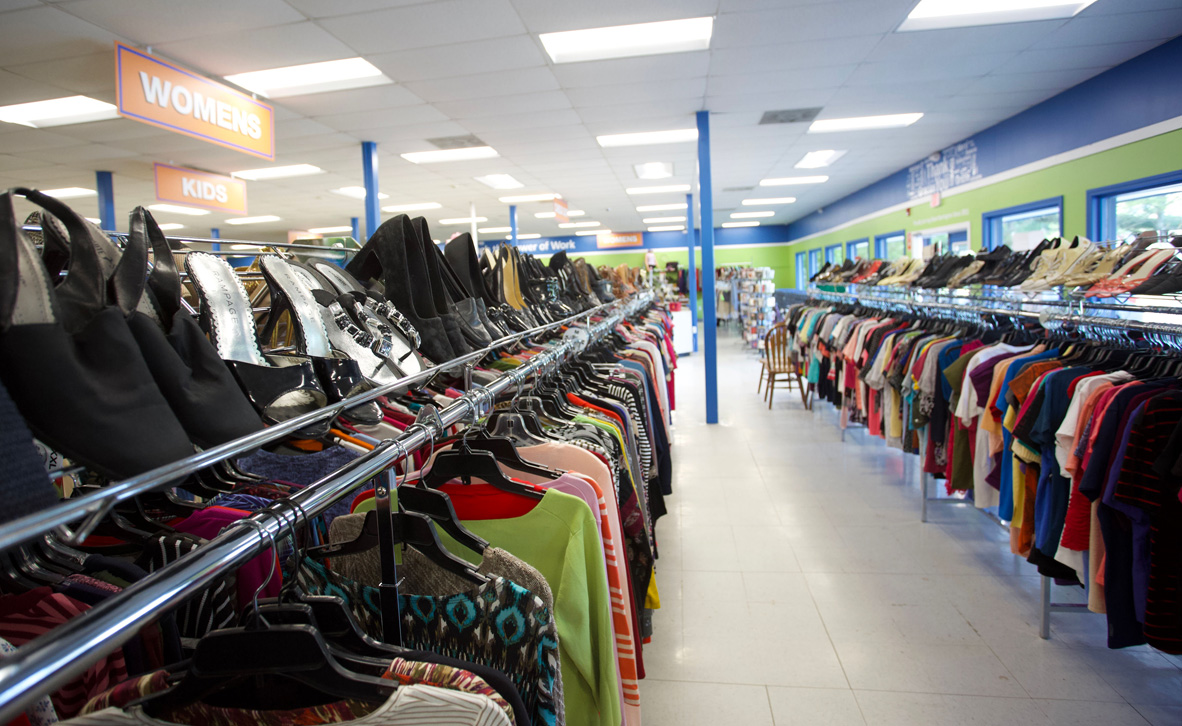 Racks of clothing inside Goodwill store