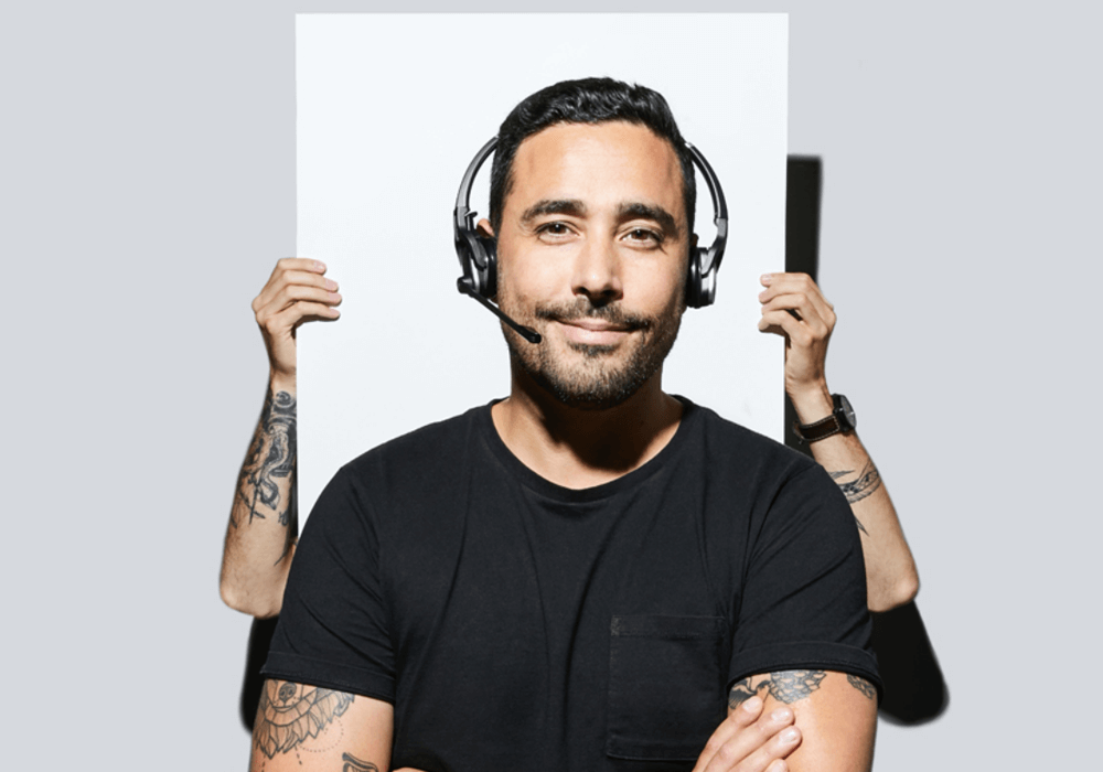 Support specialist smiling with headset on