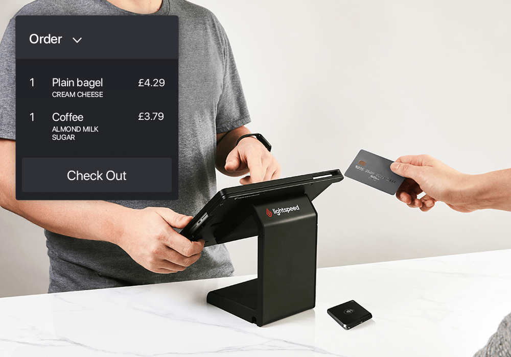 Person taking a card payment from an iPad ePOS
