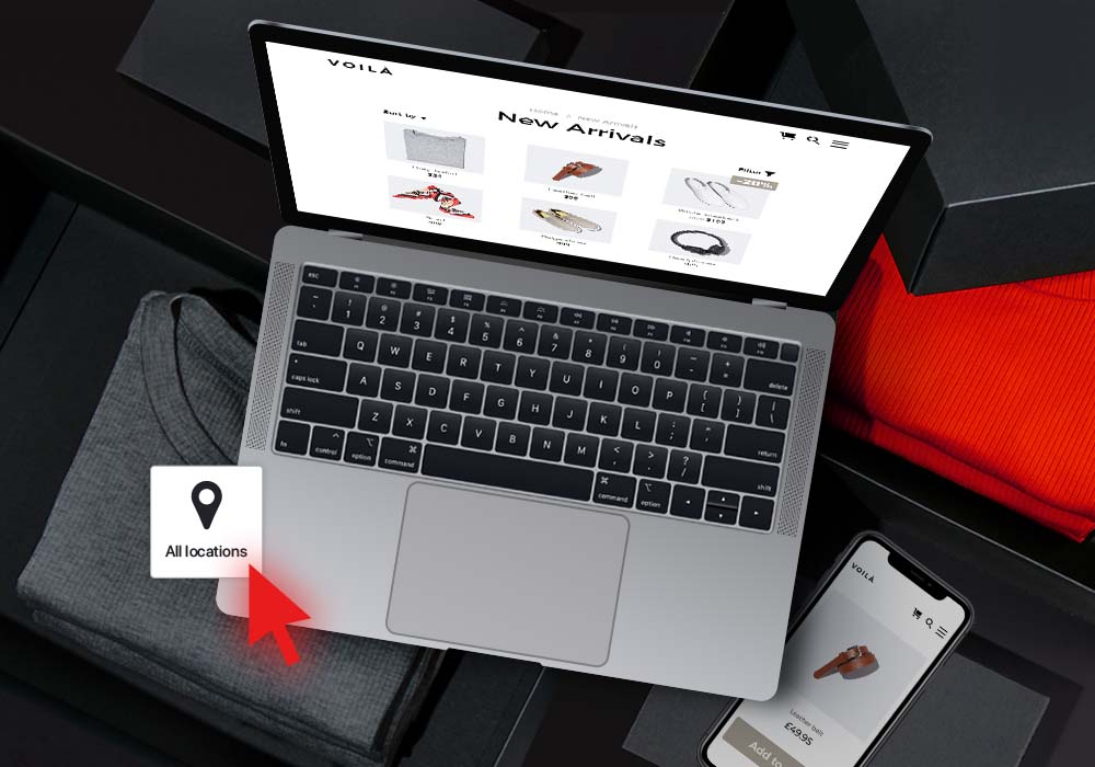 Birdseye view of laptop with a mouse curser clicking on a location pin.