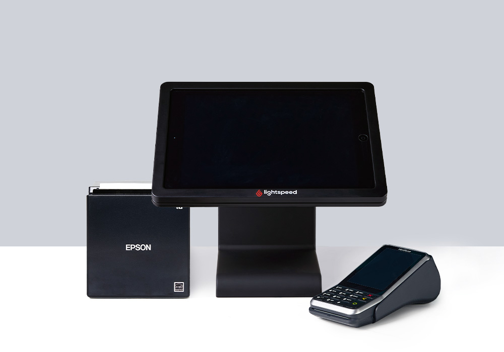 Sleek and sophisticated point of sale display with recipt printer and portable handheld payment device.