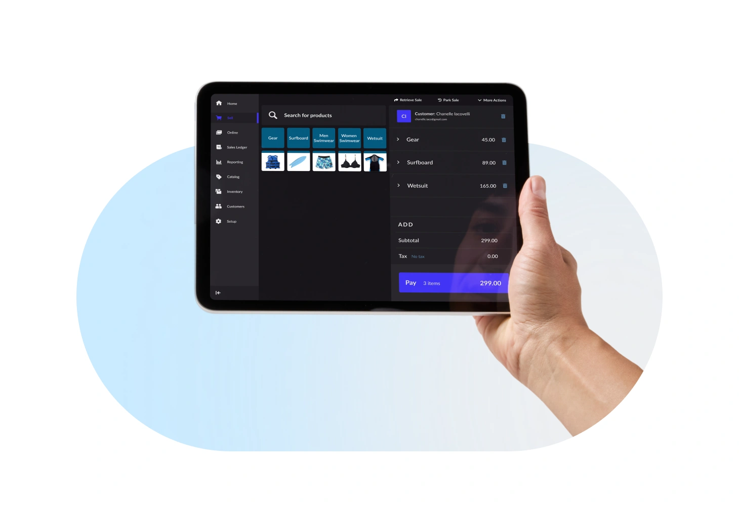 Hand holding a tablet running Lightspeed POS