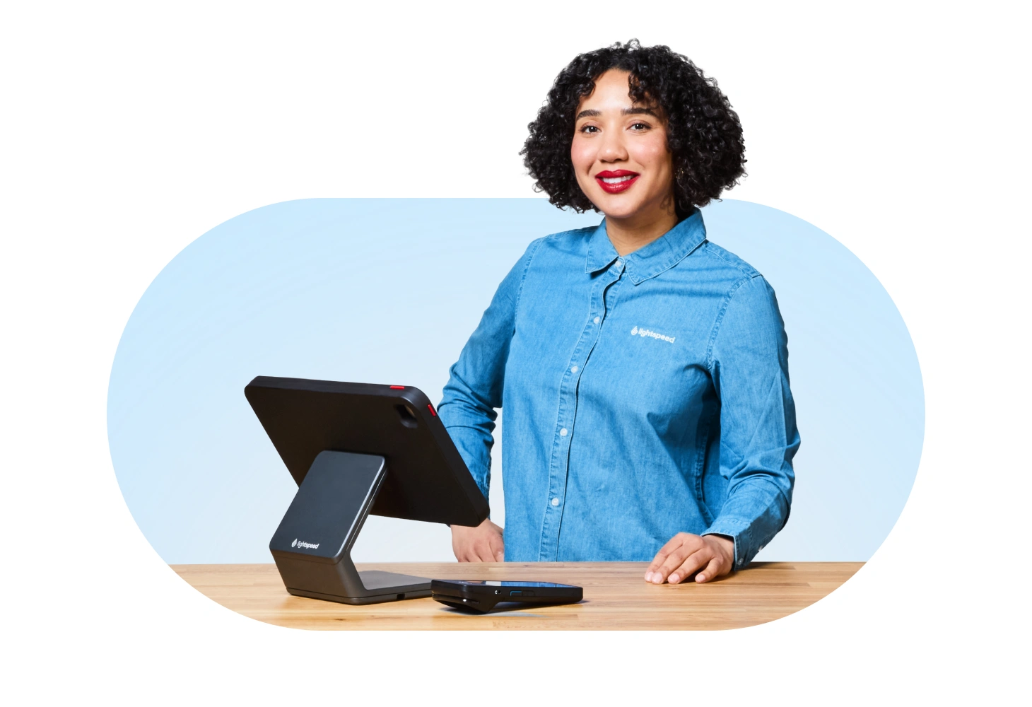 Lightspeed team member standing beside a retail POS
