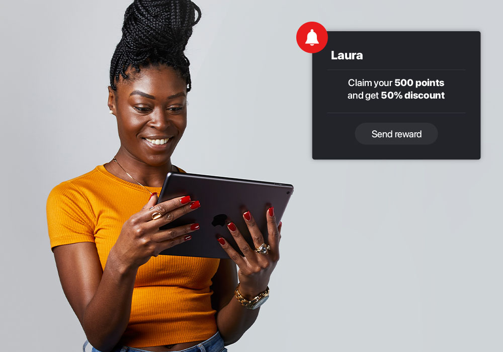 Push notification shown with hands using laptop