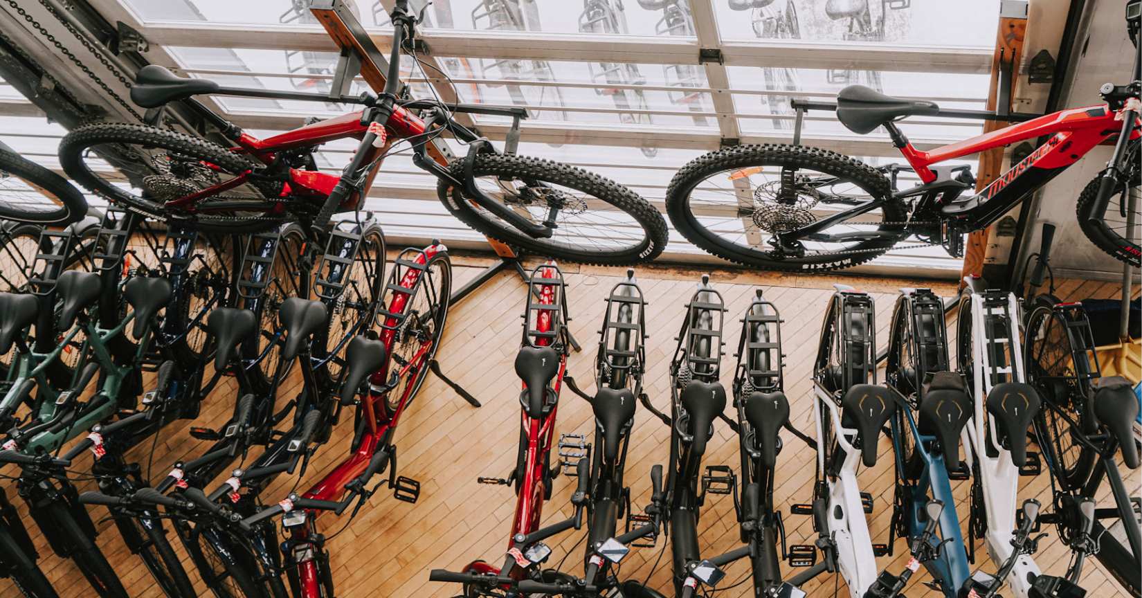 A row of bicycles seen from above.