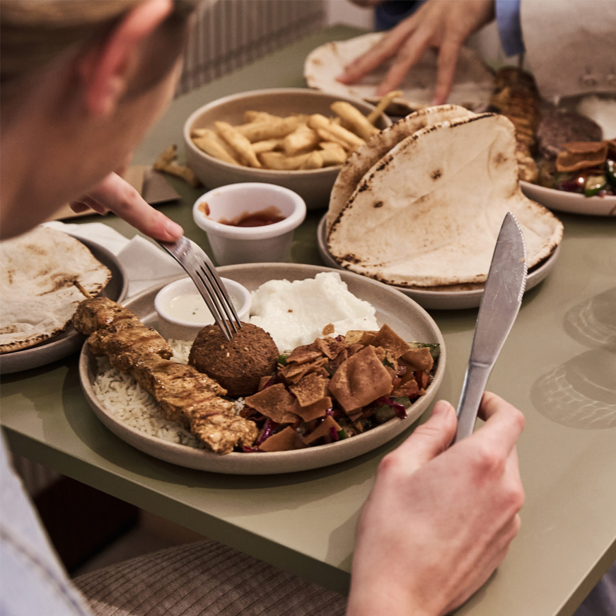 Eat Lebanese food falafel, skewer and pita bread