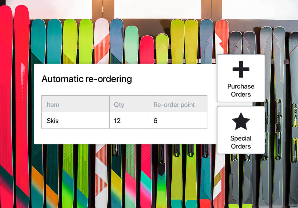 A line of skis over which the UI of a sporting goods POS is overlaid.