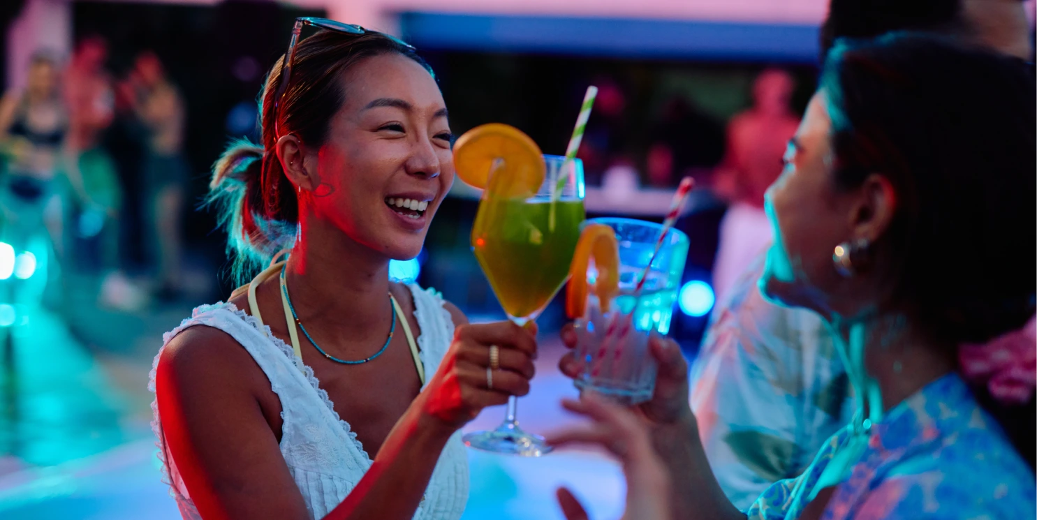Attendees enjoying drinks at a networking event