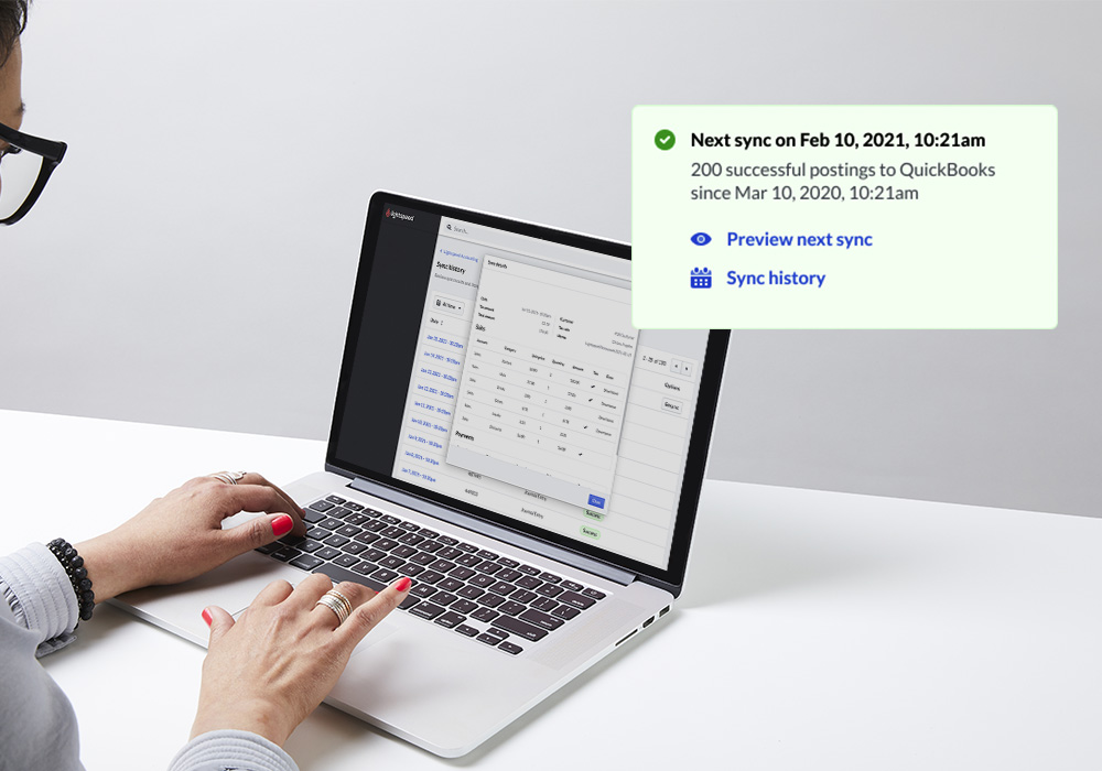 Person using Lightspeed Accounting on a laptop