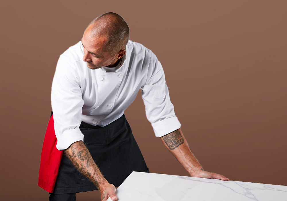 hospitality worker moving a table